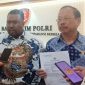 Didit Hariadi dan Yus Dharman, kuasa hukum Dirut PT CLM Helmut Hermawan saat melapor ke Bareskrim. (Dok. Ist)